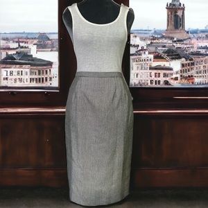 Made in a Romania straight pencil above the knee micro houndstooth skirt